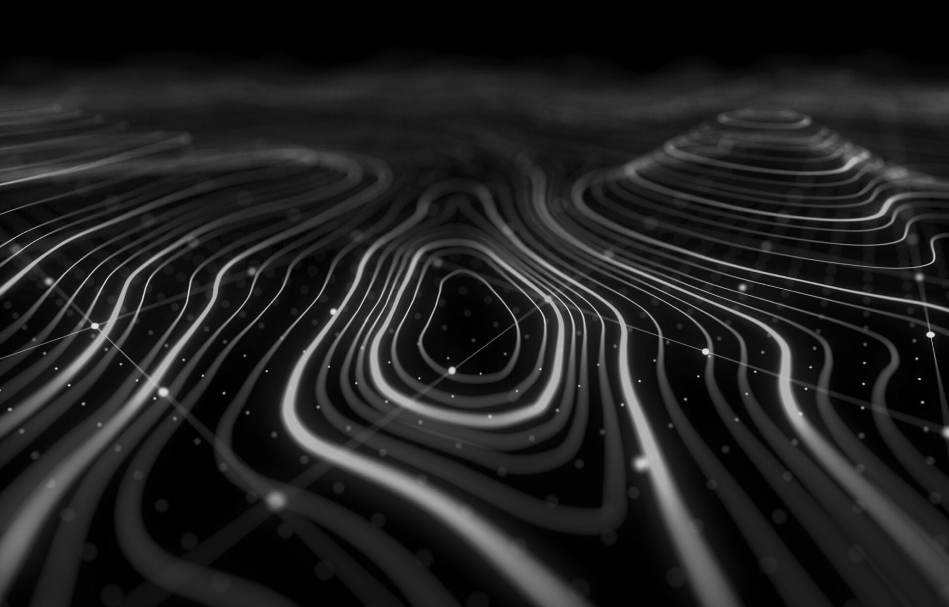 Imagen abstracta en blanco y negro que muestra líneas onduladas y luminosas y pequeños puntos que recuerdan a un mapa topográfico digital o a un paisaje, con motivos ondulados y una sensación de profundidad.
